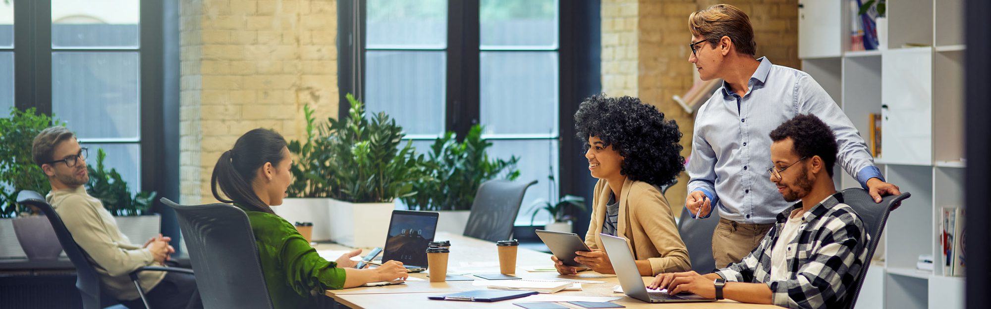 Group of people around a desk